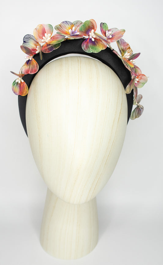 Black padded headband with multi coloured metal flower detail